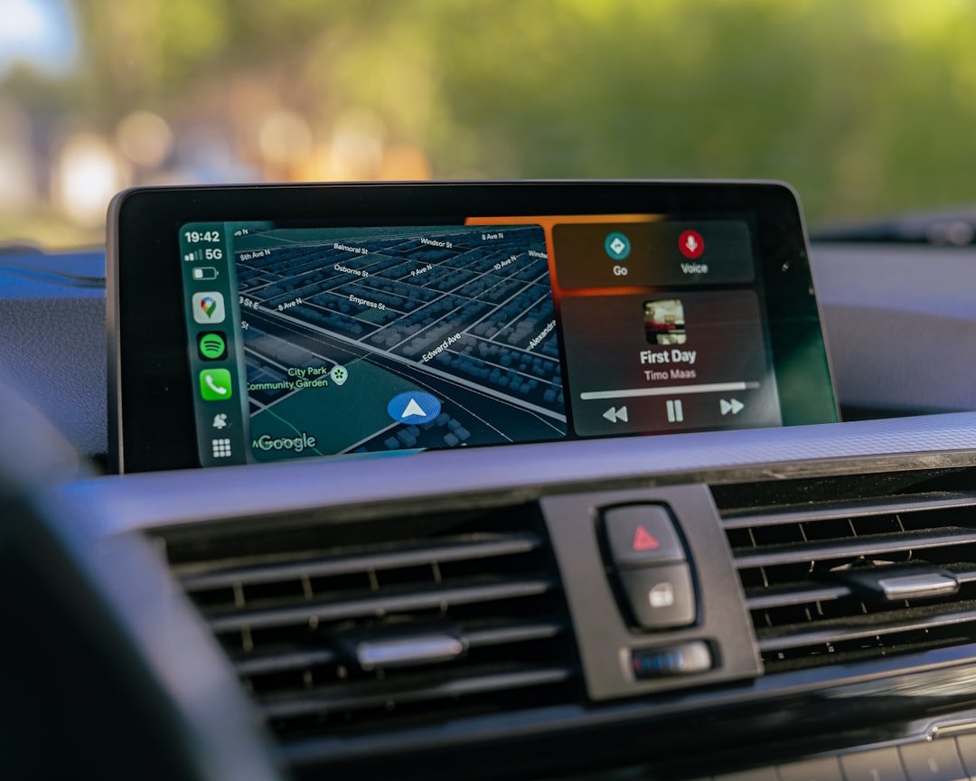 car-dashboard-displaying-navigation-and-music-apps-i3coqvpflbu